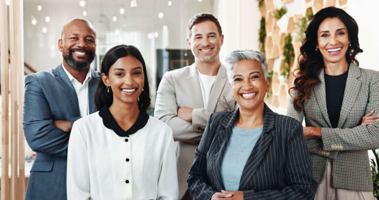 Real estate, business people and arms crossed in office portrait, team and property consultants. Un.